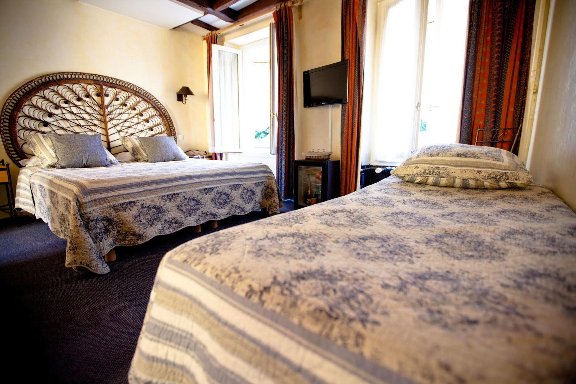 Hotel De La Tulipe ปารีส ภายนอก รูปภาพ